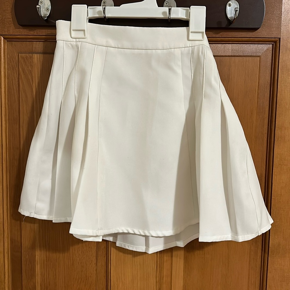 Princess Polly white pleaded tennis skirt